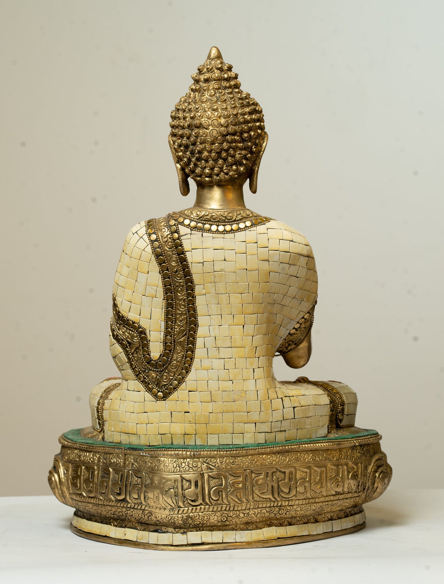 "Serene Buddha Statue with Tibetan Stone Work - Brass Figurine"