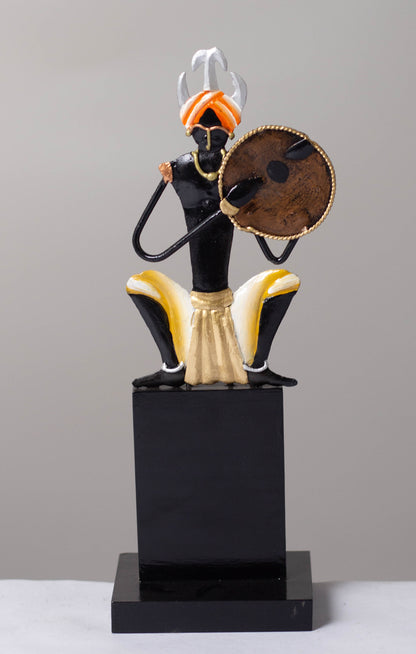 "Tribal Man with Dhapli Memento: Wrought Iron Tribal Man with Dhapli"