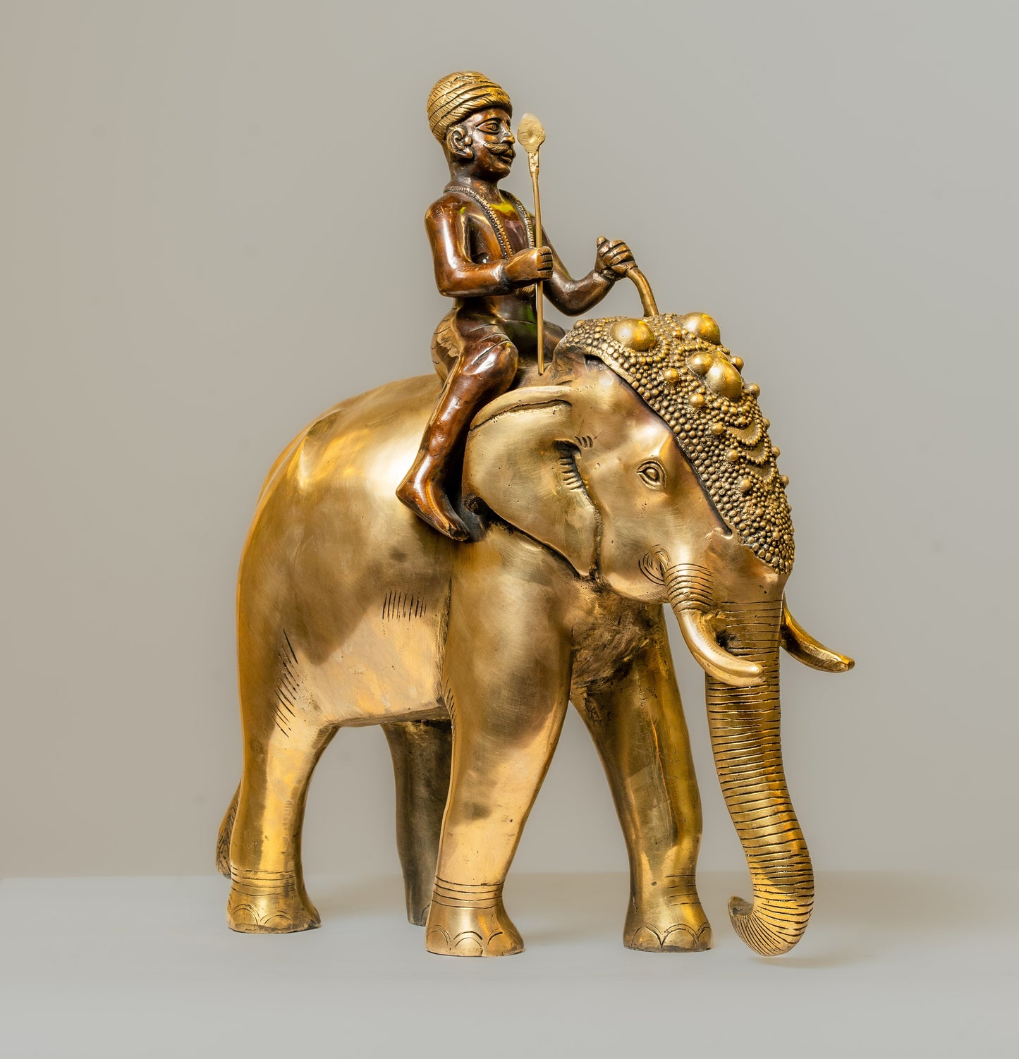 "Royal Elephant Rider Brass Statue with Black and Gold Finish"