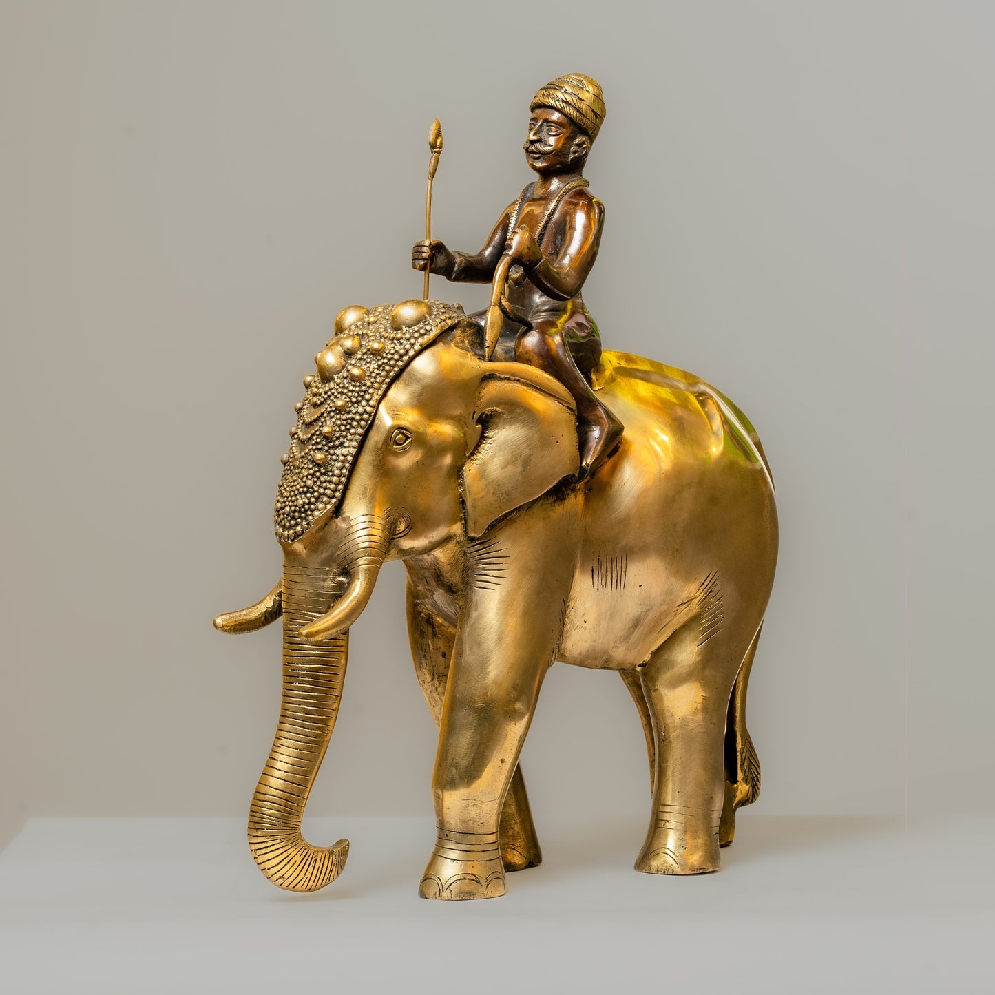 "Royal Elephant Rider Brass Statue with Black and Gold Finish"