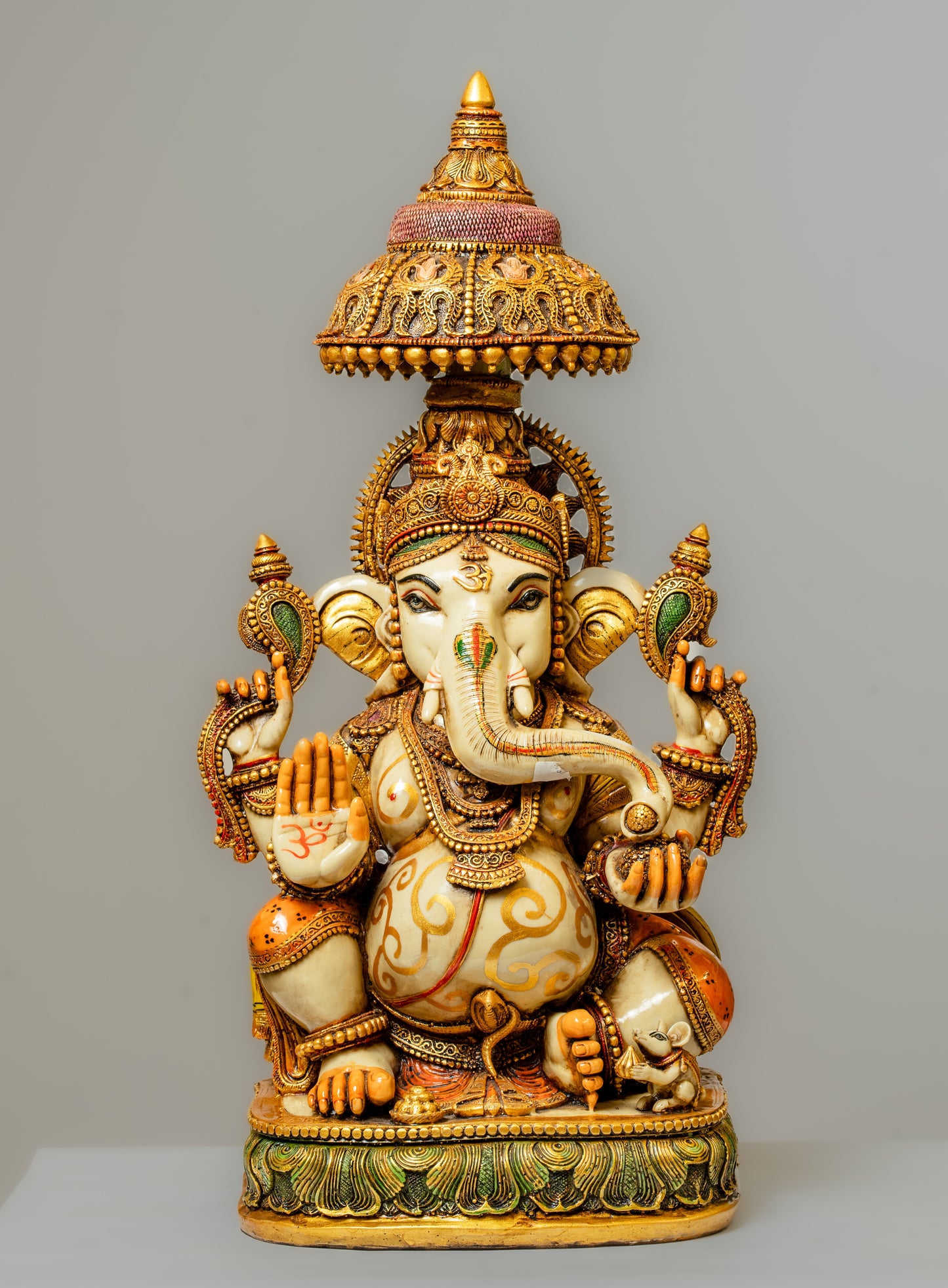 "Hand-Painted Polyresin Ganesha Statue with Ornate Crown"