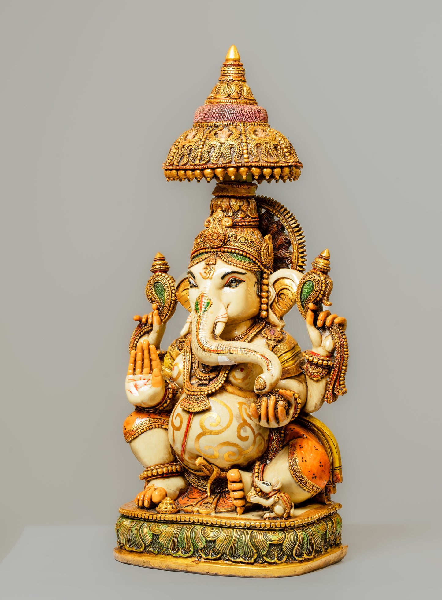 "Hand-Painted Polyresin Ganesha Statue with Ornate Crown"