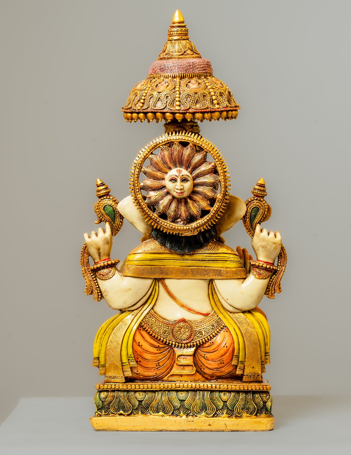 "Hand-Painted Polyresin Ganesha Statue with Ornate Crown"